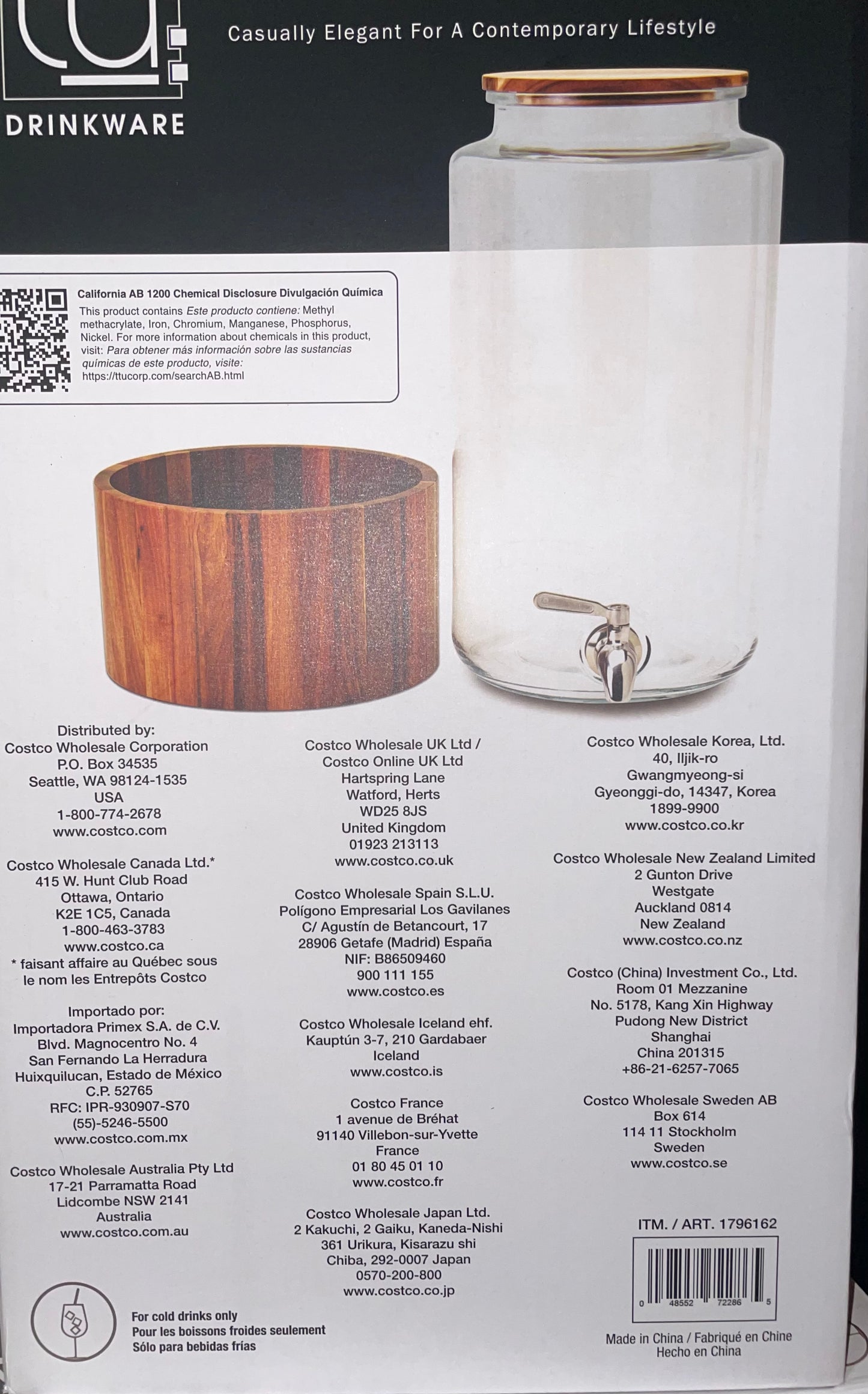 The Studio Tu Glass Drink Dispenser with acacia wood stand